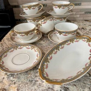 Limoges cups and saucers UC Frace Lyon pattern/7 sets